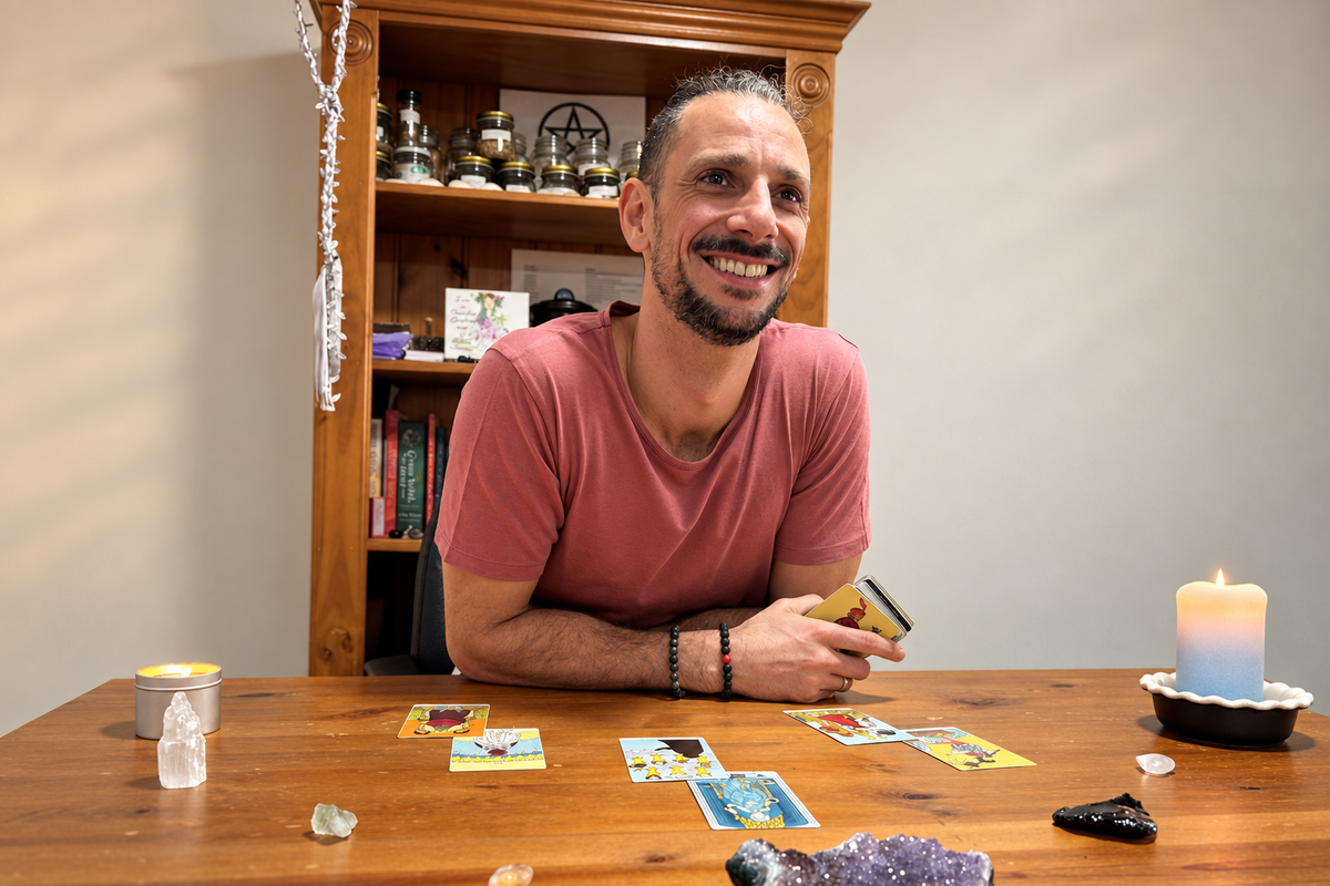 Tarot reader Mario offering an online Tarot reading at his reading table